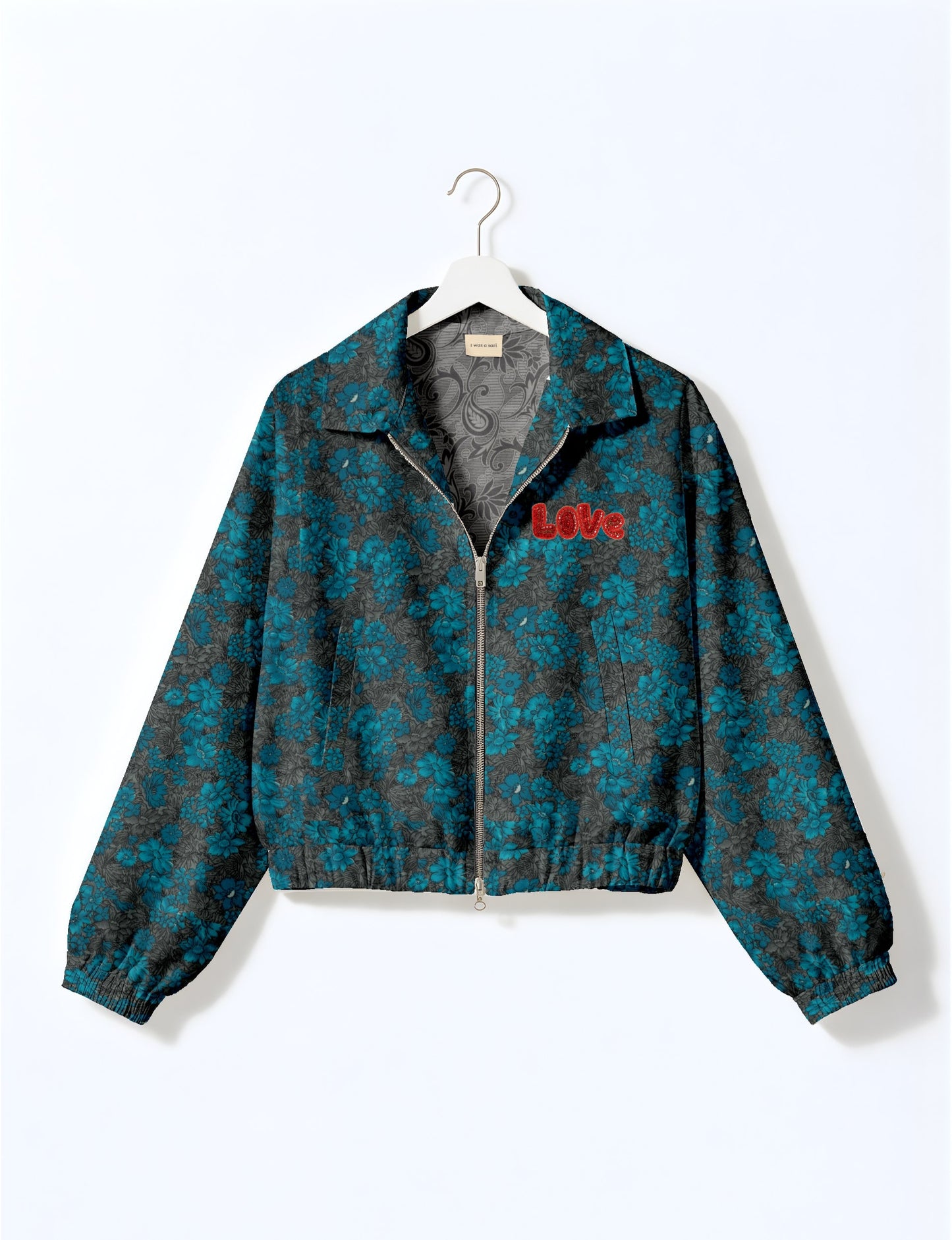 Love Bomber Jacket made from recycled fabric, featuring hand-stitched Aari embroidery. A unique piece of zero-waste clothing, part of the circular fashion movement. Designed with upcycled materials for a stylish yet environmentally friendly clothing choice.