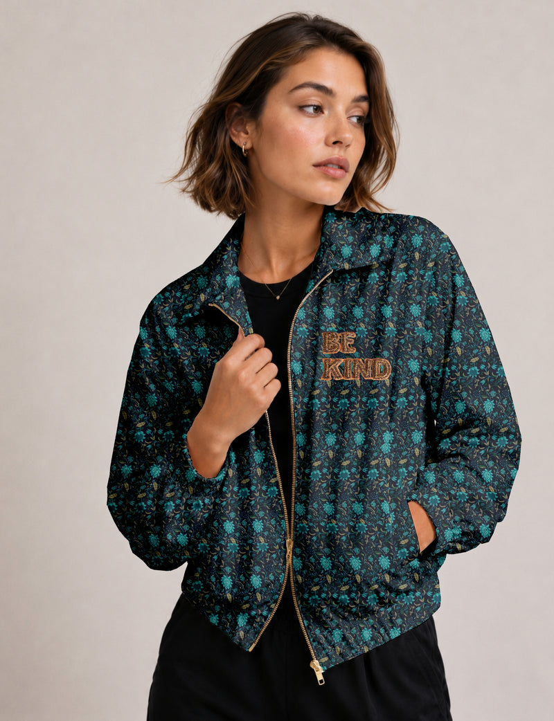 BE KIND Bomber jacket made from upcycled sari fabric with handcrafted Aari embroidery by female artisans.