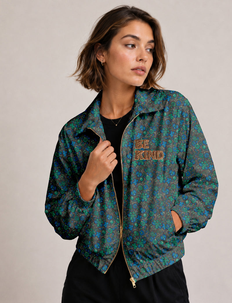 BE KIND Bomber jacket made from upcycled sari fabric with handcrafted Aari embroidery by female artisans.
