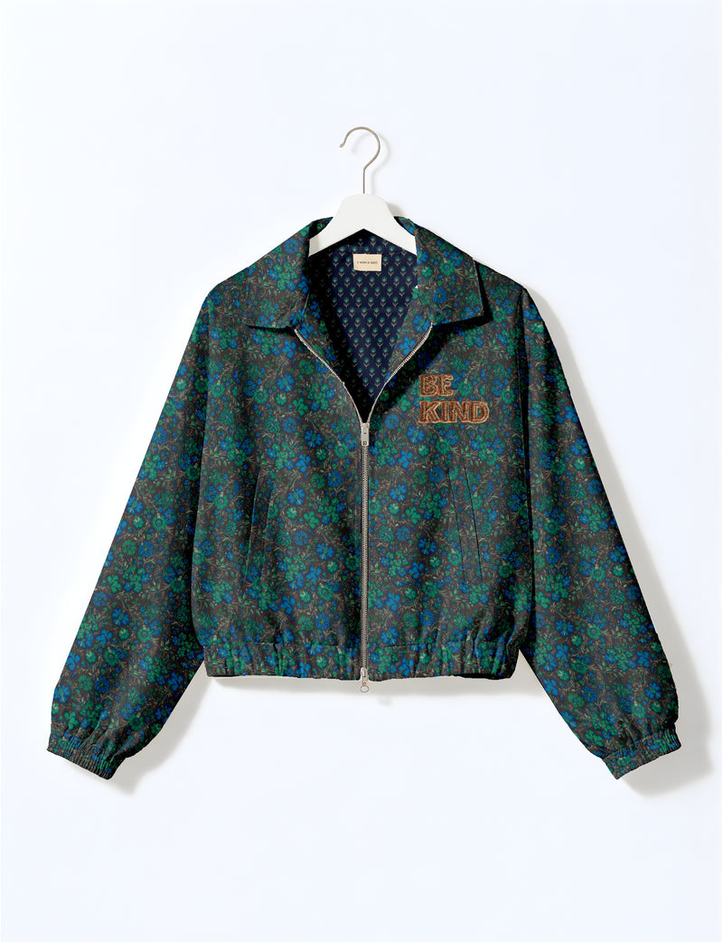 BE KIND Bomber jacket made from upcycled sari fabric with handcrafted Aari embroidery by female artisans.