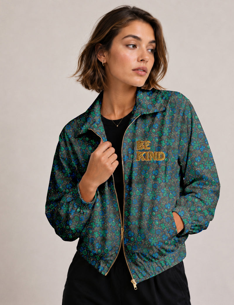 BE KIND Bomber jacket made from upcycled sari fabric with handcrafted Aari embroidery by female artisans.