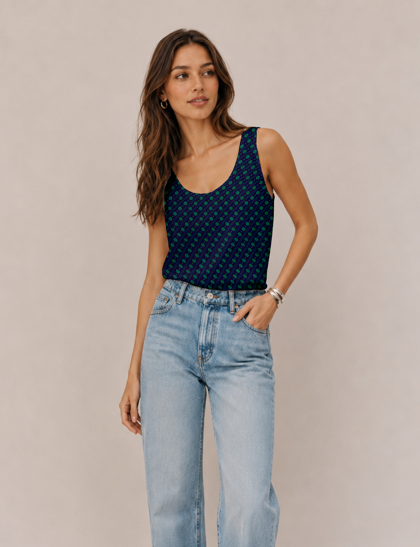 Women's sleeveless blouse with a relaxed straight fit, wide scoop neckline, deep scoop back, and hip-length silhouette.