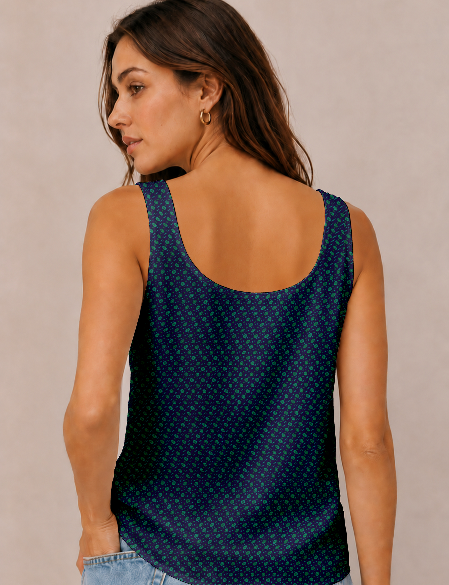 Women's sleeveless blouse with a relaxed straight fit, wide scoop neckline, deep scoop back, and hip-length silhouette.