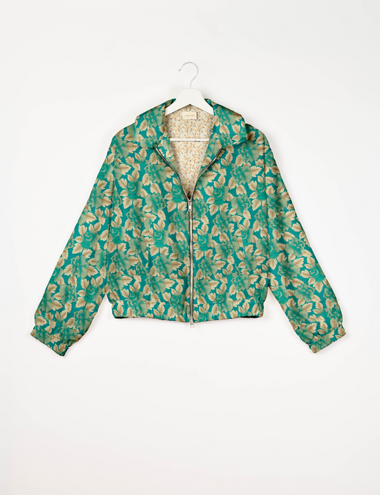 Upcycled Bomber Jacket made from recycled sari materials, featuring a cute cropped shape, elasticated hem and cuffs, and contrast sari print lining. Sustainable apparel promoting eco-friendly fashion and ethical clothing.