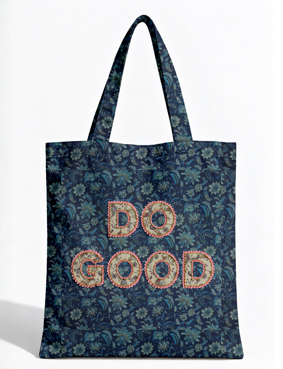 DO GOOD tote bag featuring contrasting sari fabric appliqué lettering, double shoulder straps, soft construction and an internal slip pocket with piping detail.