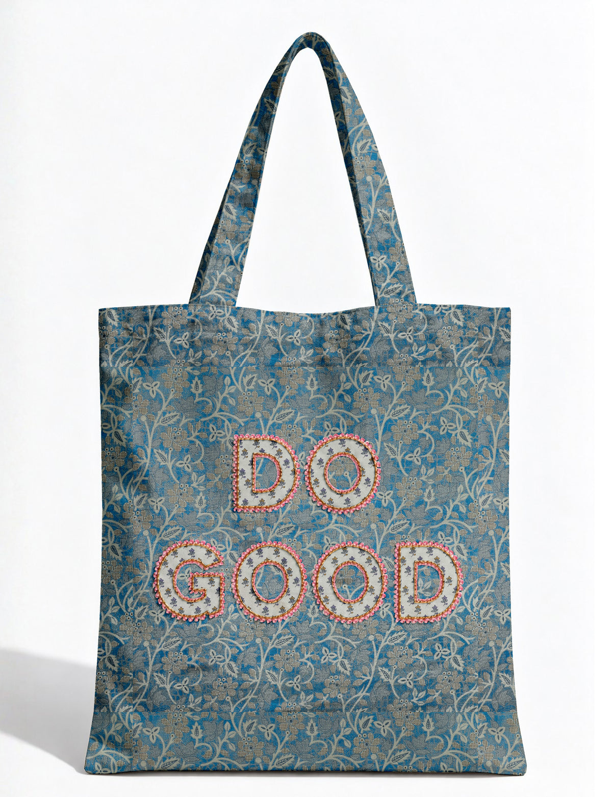 DO GOOD tote bag featuring contrasting sari fabric appliqué lettering, double shoulder straps, soft construction and an internal slip pocket with piping detail.