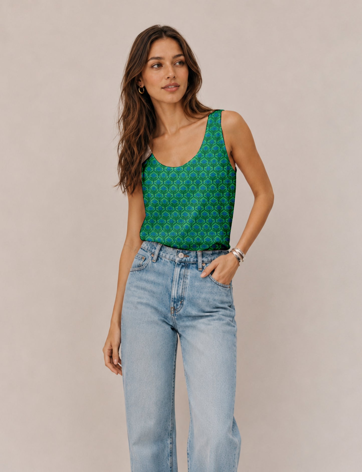 Women's sleeveless blouse with a relaxed straight fit, wide scoop neckline, deep scoop back, and hip-length silhouette.