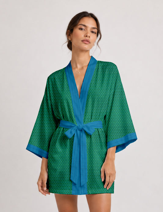 Short kimono robe with wrap front, V-neckline, wide sleeves, waist tie, and concealed skort detail.
