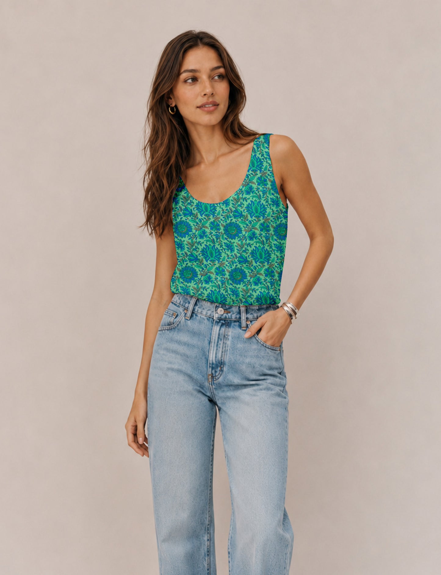 Women's sleeveless blouse with a relaxed straight fit, wide scoop neckline, deep scoop back, and hip-length silhouette.