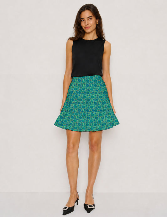 Short tiered skirt with a fitted waistband, knife pleats, softly flared silhouette, side seam pockets, and above-the-knee length.