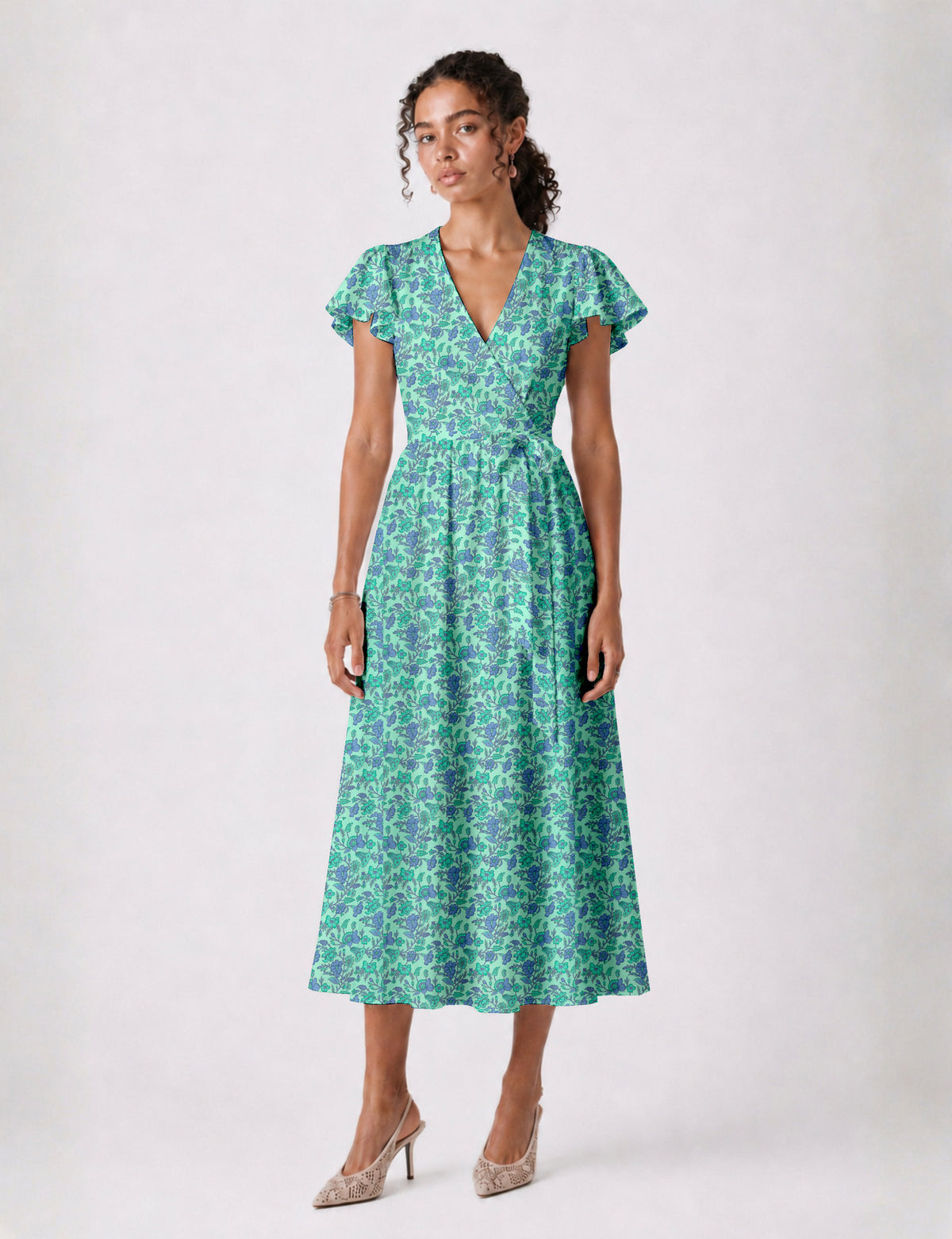 Elegant midi wrap dress with a V-neckline, adjustable waist tie, fitted bodice, and flared skirt for a timeless, flattering silhouette.