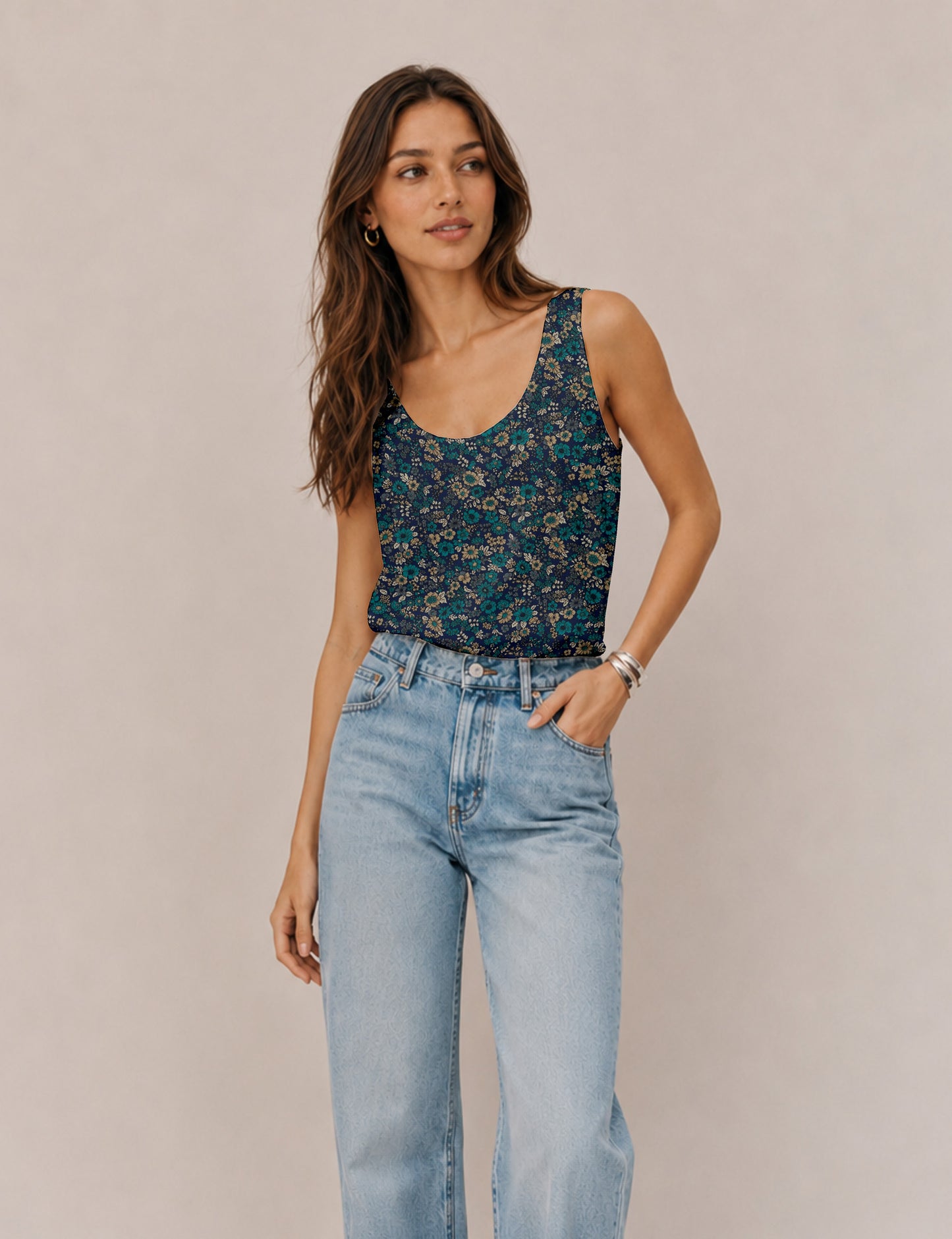 Women's sleeveless blouse with a relaxed straight fit, wide scoop neckline, deep scoop back, and hip-length silhouette.