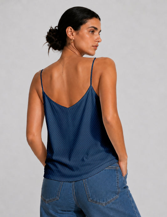 Women's sleeveless slip top with a relaxed straight fit, soft V-neckline, deep V-back, and delicate spaghetti straps.