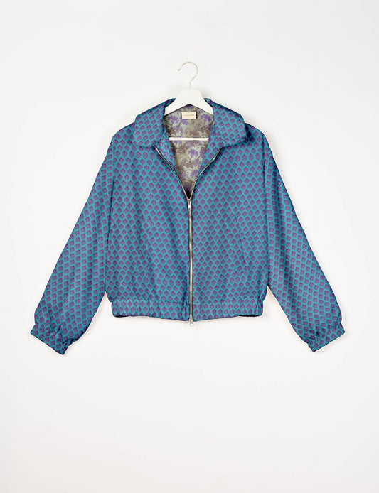 Upcycled Bomber Jacket made from recycled sari materials, featuring a cute cropped shape, elasticated hem and cuffs, and contrast sari print lining. Sustainable apparel promoting eco-friendly fashion and ethical clothing.