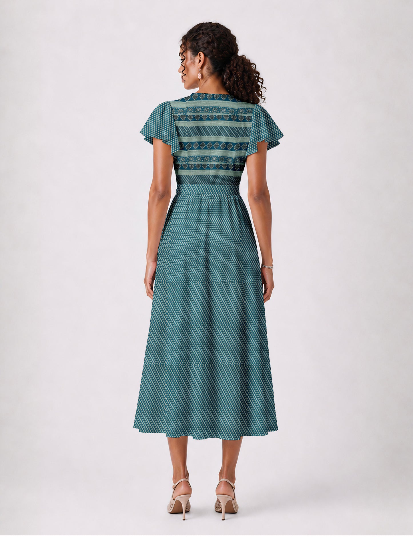 Elegant midi wrap dress with a V-neckline, adjustable waist tie, fitted bodice, and flared skirt for a timeless, flattering silhouette.