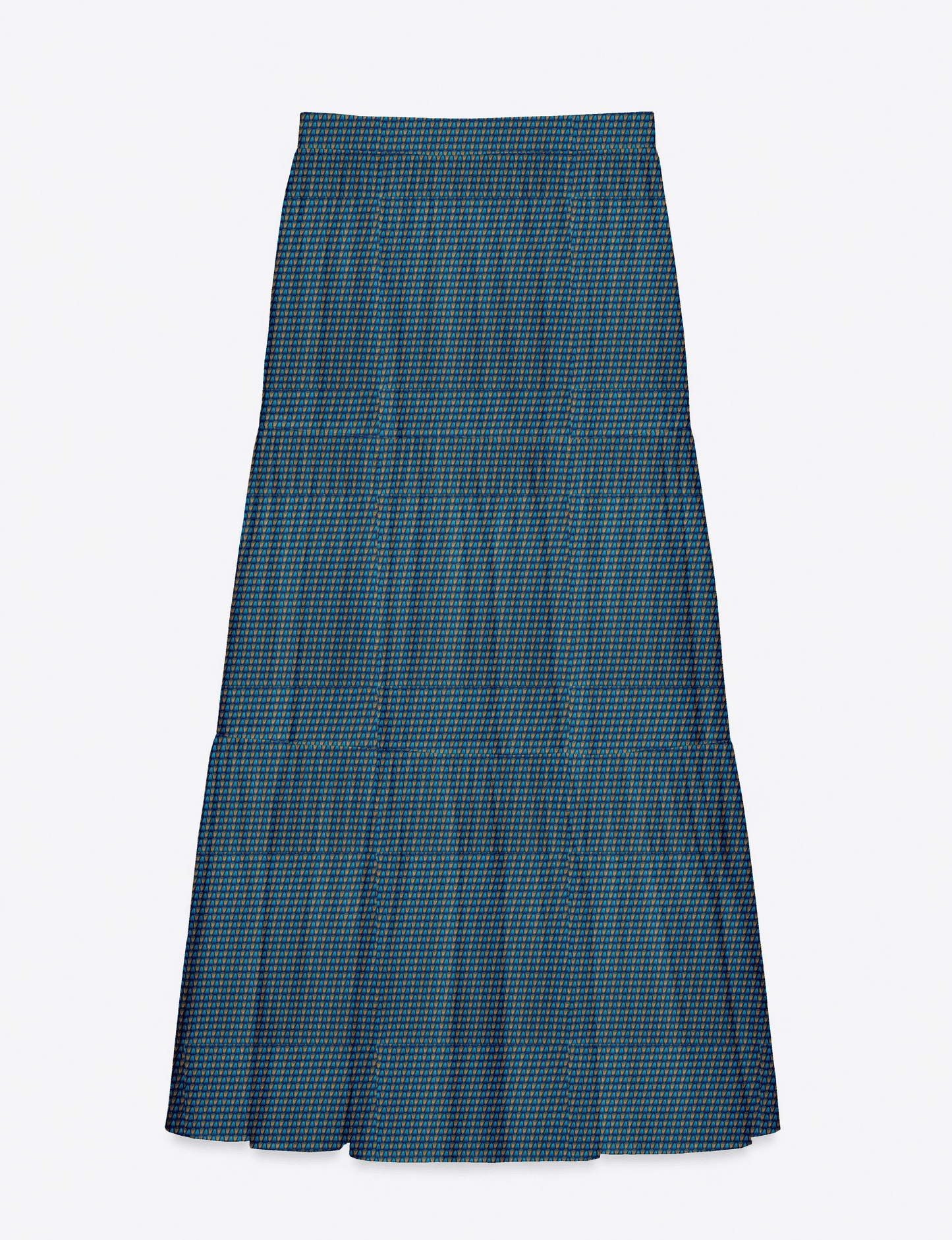 Woman wearing a yellow midi tiered skirt with a small geometric pattern, shown from the back, paired with beige top and
