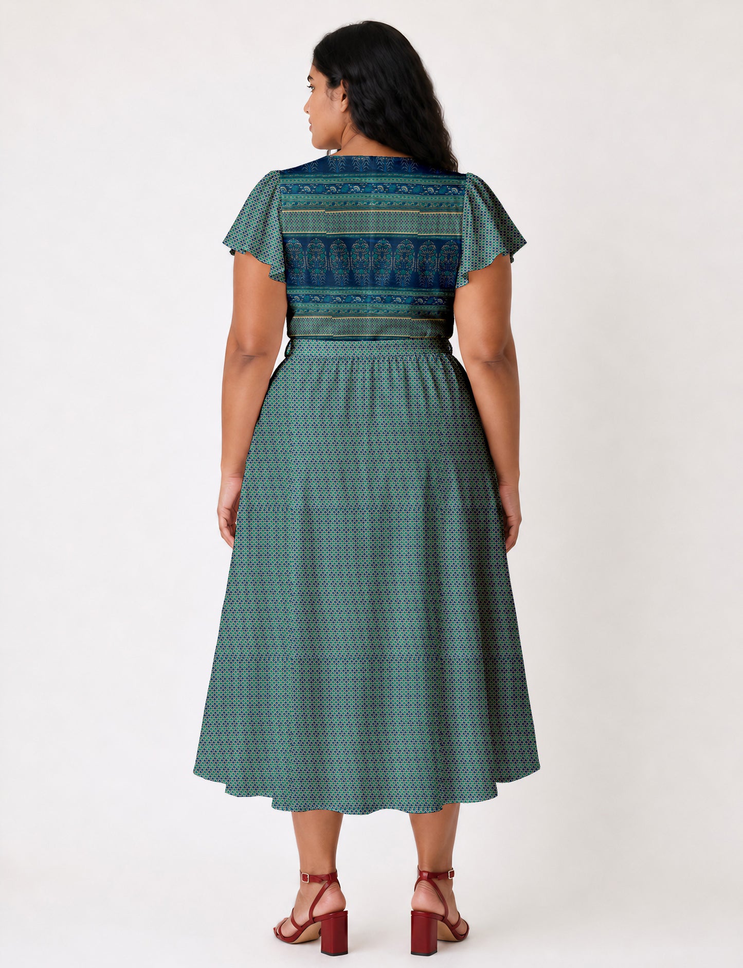 Elegant midi wrap dress with a V-neckline, adjustable waist tie, fitted bodice, and flared skirt for a timeless, flattering silhouette.