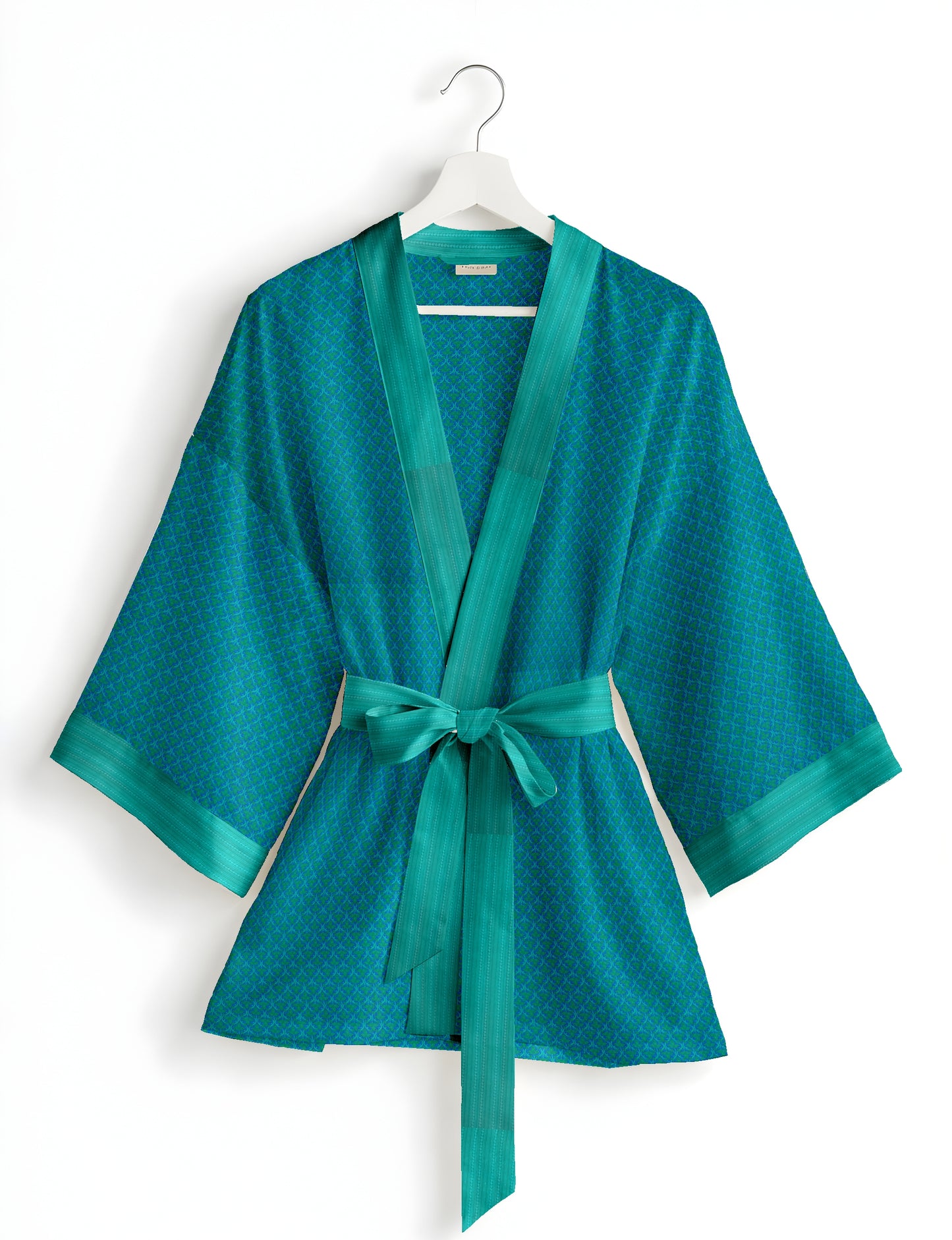 Short kimono robe with wrap front, V-neckline, wide sleeves, waist tie, and concealed skort detail.