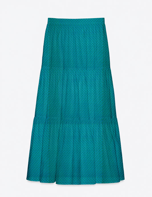 Midi tiered skirt with fitted waistband, soft knife pleats, flared silhouette, side seam pockets, and ankle-length hem