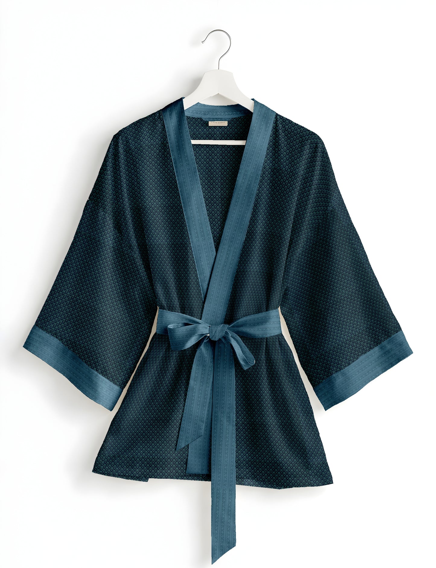 Short kimono robe with wrap front, V-neckline, wide sleeves, waist tie, and concealed skort detail.