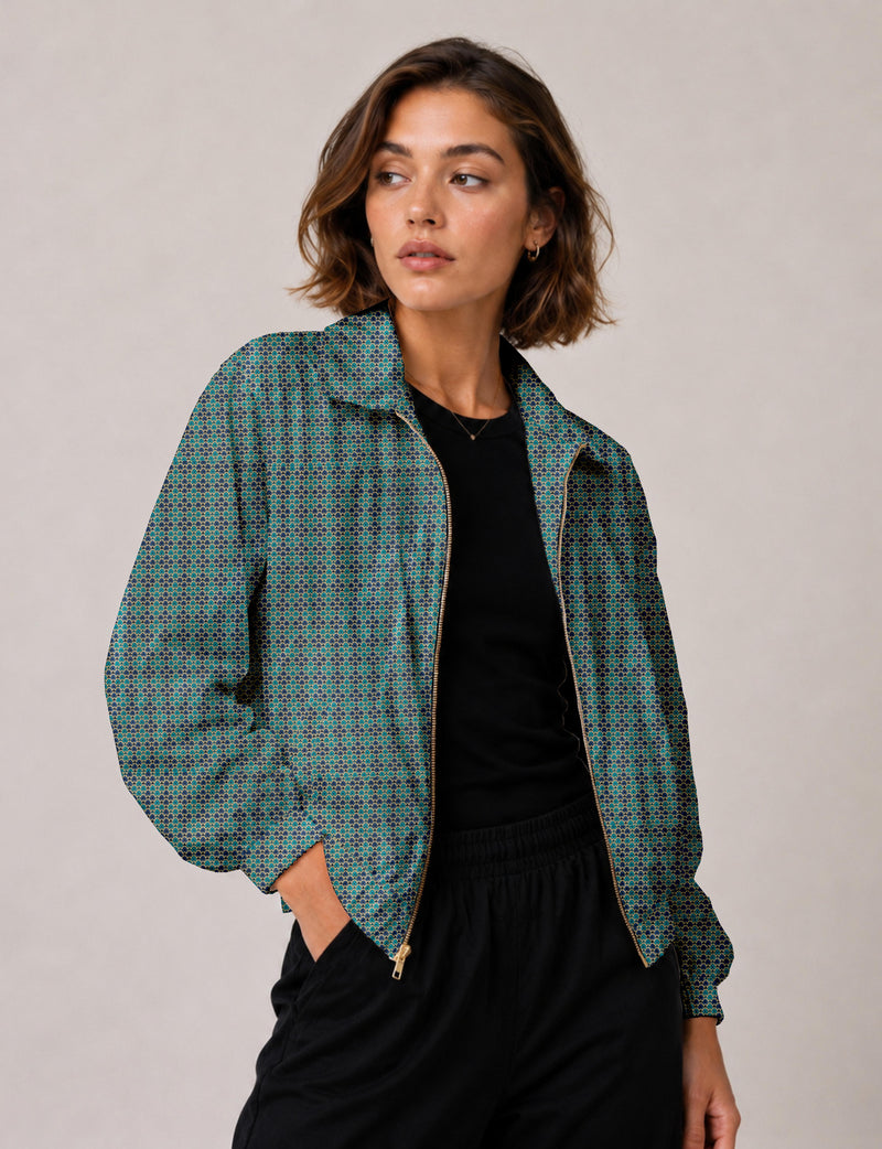 Blue bomber jacket with micro pattern, front zipper, worn by model in a front view