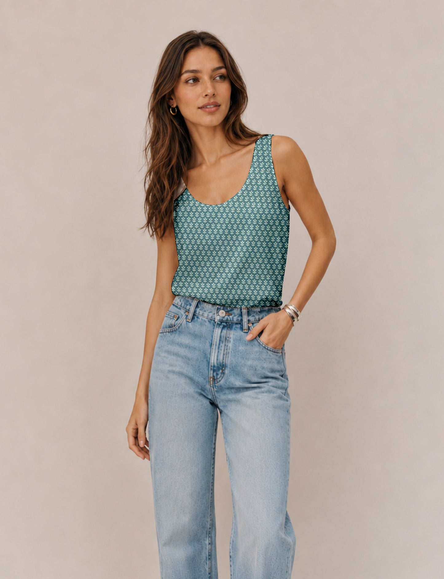Women's sleeveless blouse with a relaxed straight fit, wide scoop neckline, deep scoop back, and hip-length silhouette.