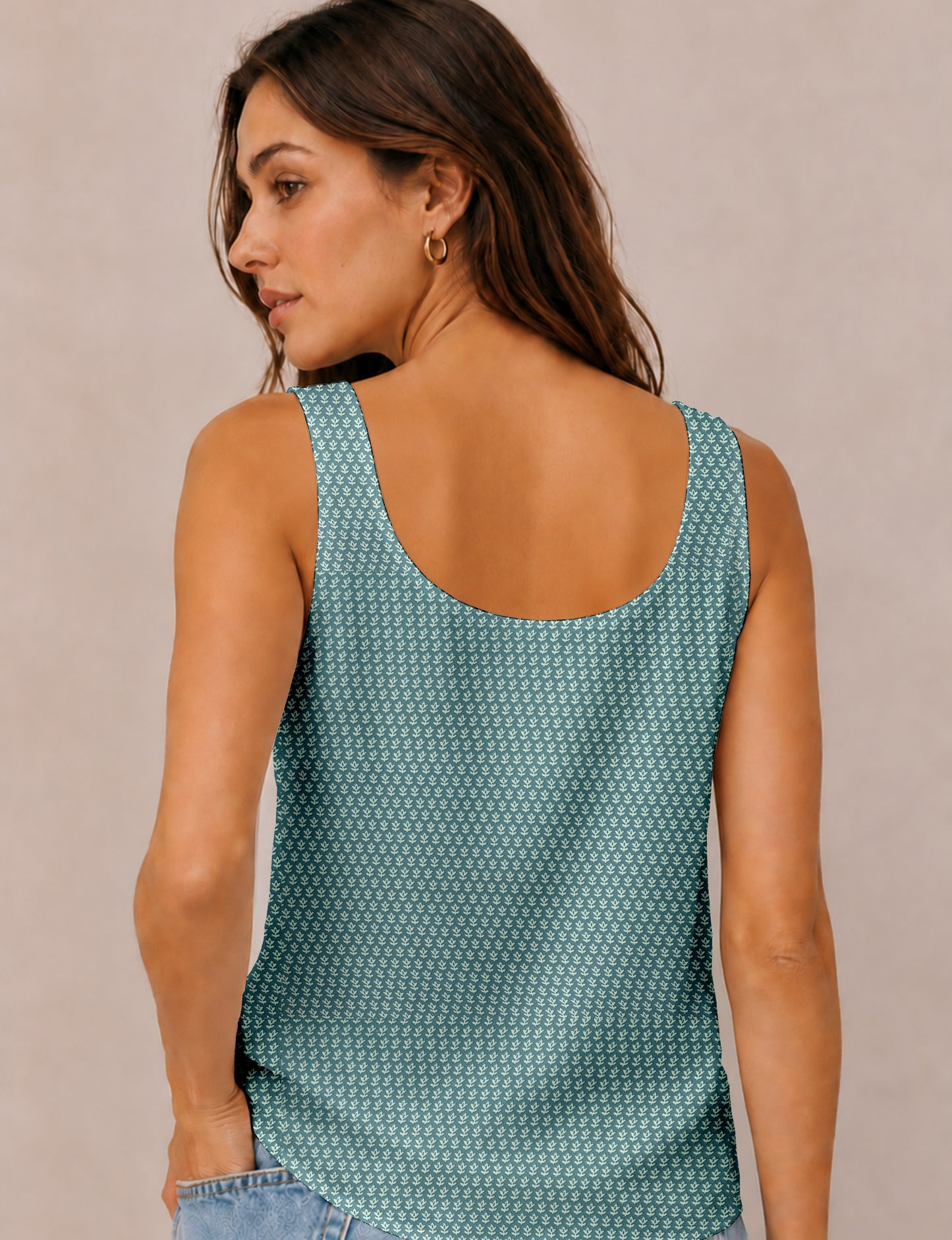 Women's sleeveless blouse with a relaxed straight fit, wide scoop neckline, deep scoop back, and hip-length silhouette.