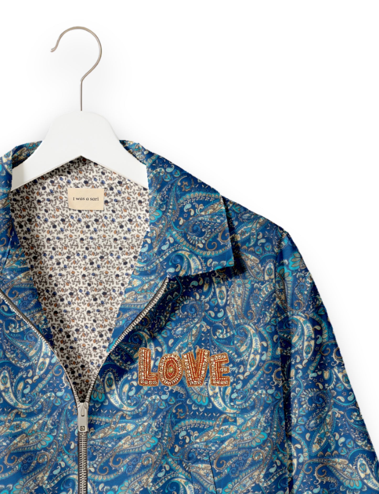 Love Bomber Jacket made from recycled fabric, featuring hand-stitched Aari embroidery. A unique piece of zero-waste clothing, part of the circular fashion movement. Designed with upcycled materials for a stylish yet environmentally friendly clothing choice.