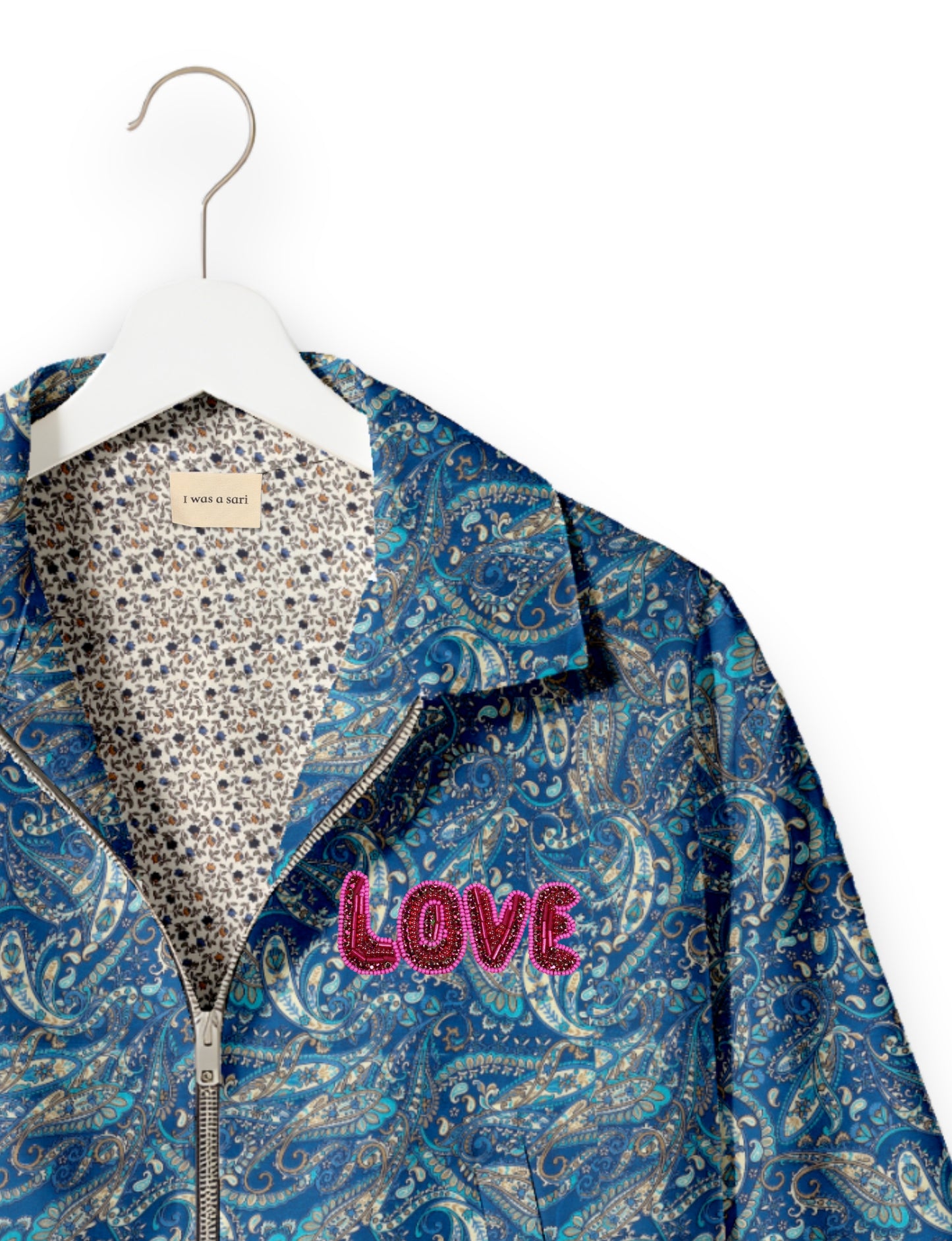 Love Bomber Jacket made from recycled fabric, featuring hand-stitched Aari embroidery. A unique piece of zero-waste clothing, part of the circular fashion movement. Designed with upcycled materials for a stylish yet environmentally friendly clothing choice.