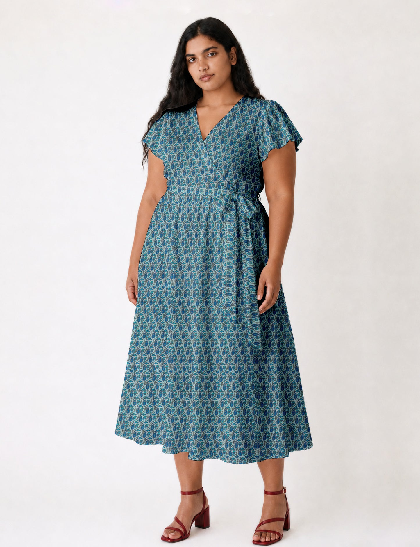 Elegant midi wrap dress with a V-neckline, adjustable waist tie, fitted bodice, and flared skirt for a timeless, flattering silhouette.