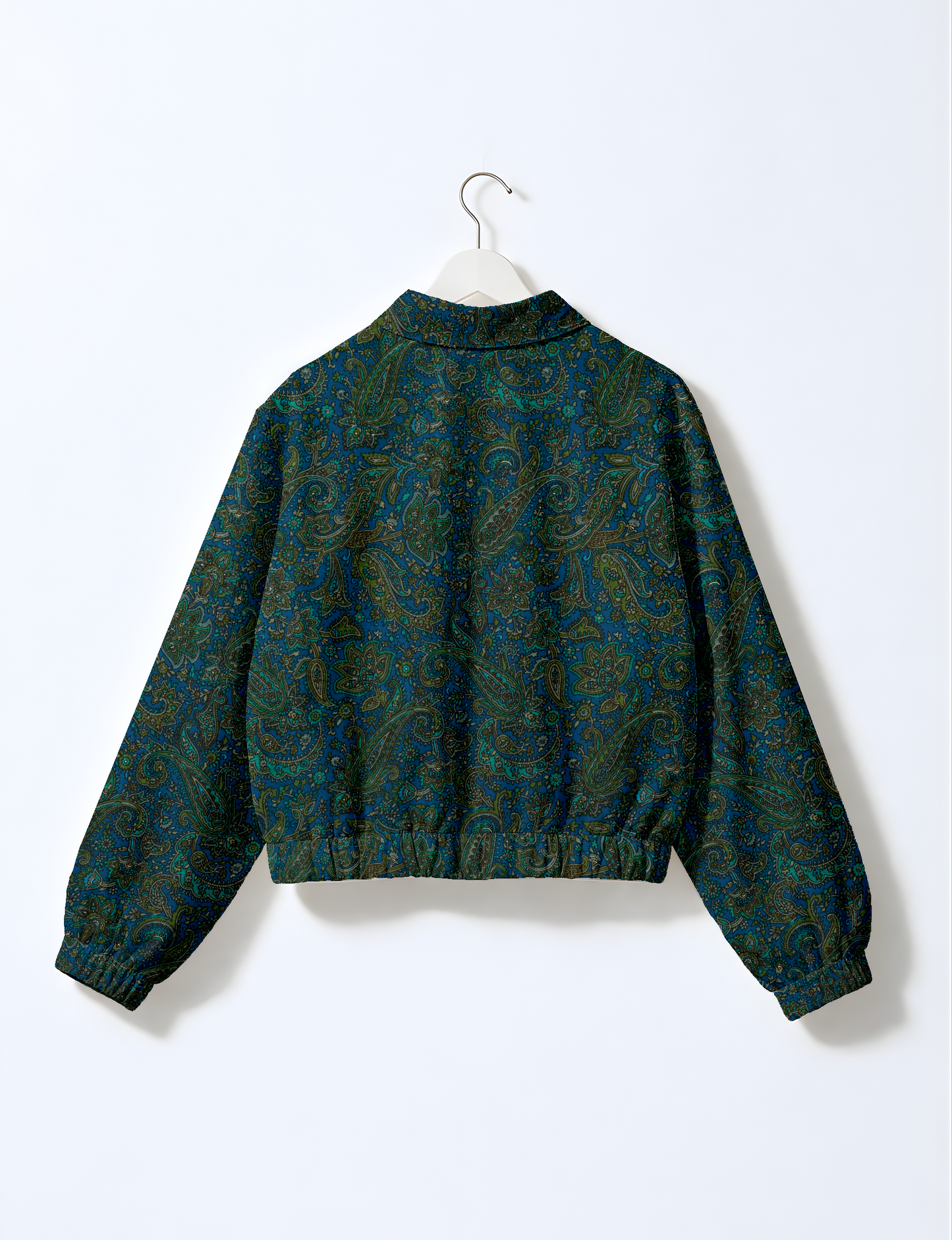 Upcycled Bomber Jacket made from recycled sari materials, featuring a cute cropped shape, elasticated hem and cuffs, and contrast sari print lining. Sustainable apparel promoting eco-friendly fashion and ethical clothing.