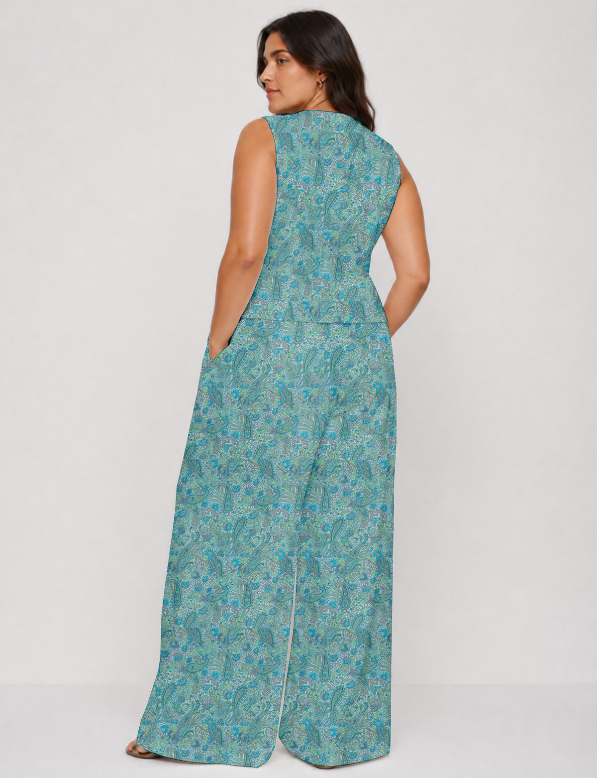 Women's tailored waistcoat set with a sleeveless V-neck button-front waistcoat and high-rise wide leg trousers in a coordinated matching outfit.