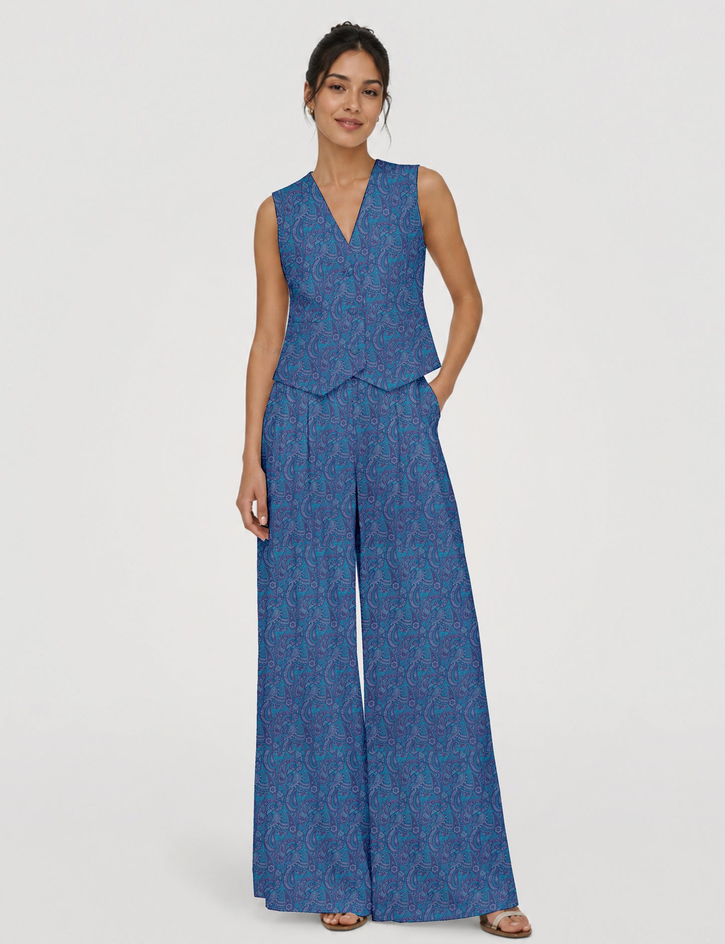 Women's tailored waistcoat set with a sleeveless V-neck button-front waistcoat and high-rise wide leg trousers in a coordinated matching outfit.
