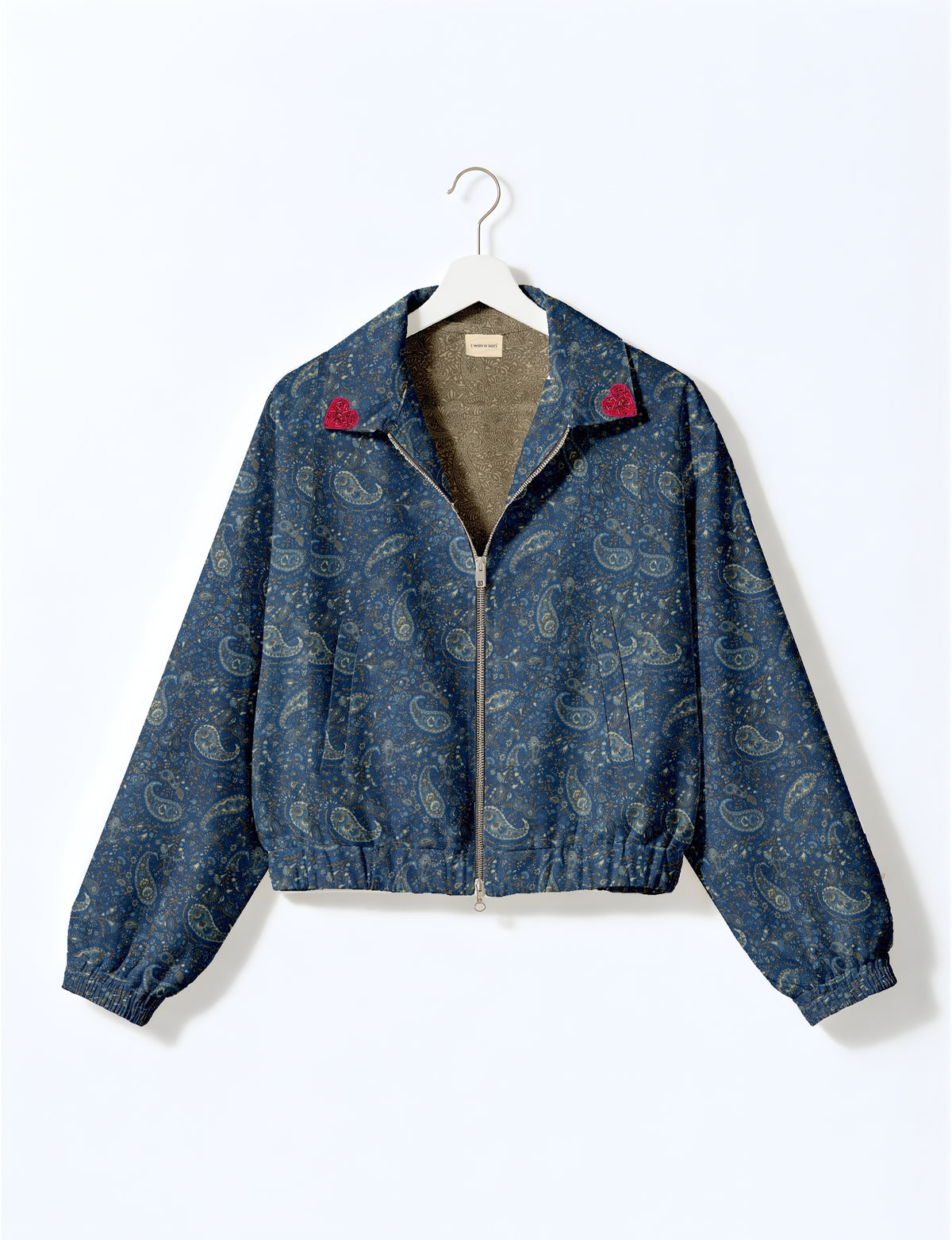 Love Bomber Jacket made from recycled fabric, featuring hand-stitched Aari embroidery. A unique piece of zero-waste clothing, part of the circular fashion movement. Designed with upcycled materials for a stylish yet environmentally friendly clothing choice.