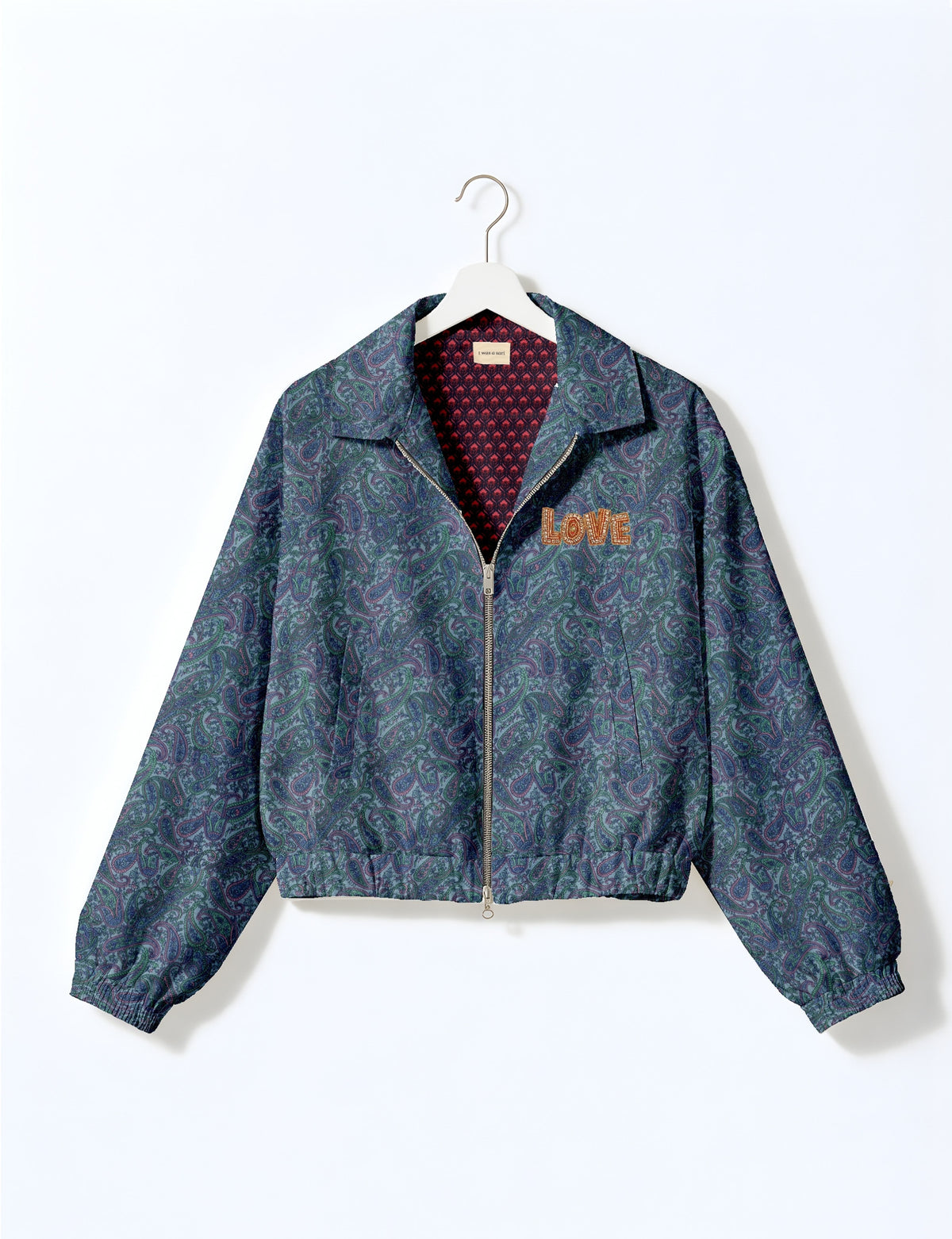 Love Bomber Jacket made from recycled fabric, featuring hand-stitched Aari embroidery. A unique piece of zero-waste clothing, part of the circular fashion movement. Designed with upcycled materials for a stylish yet environmentally friendly clothing choice.
