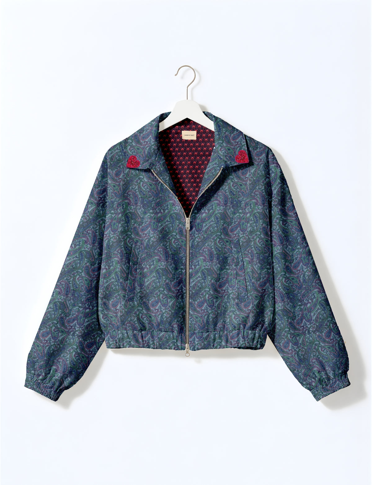 Love Bomber Jacket made from recycled fabric, featuring hand-stitched Aari embroidery. A unique piece of zero-waste clothing, part of the circular fashion movement. Designed with upcycled materials for a stylish yet environmentally friendly clothing choice.