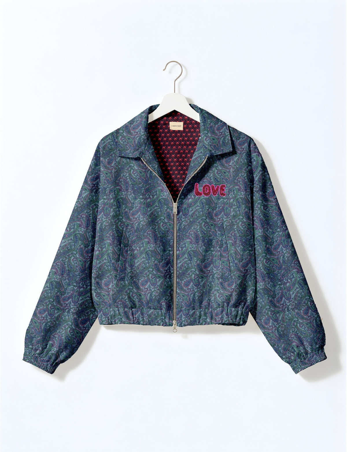 Love Bomber Jacket made from recycled fabric, featuring hand-stitched Aari embroidery. A unique piece of zero-waste clothing, part of the circular fashion movement. Designed with upcycled materials for a stylish yet environmentally friendly clothing choice.