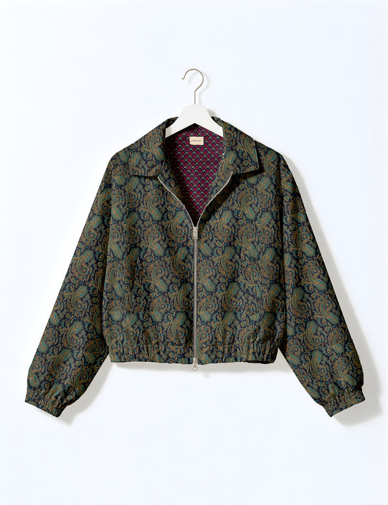 Brown floral bomber jacket with front zipper, elastic cuffs and hem, hanging on white hanger, red floral inner lining visible