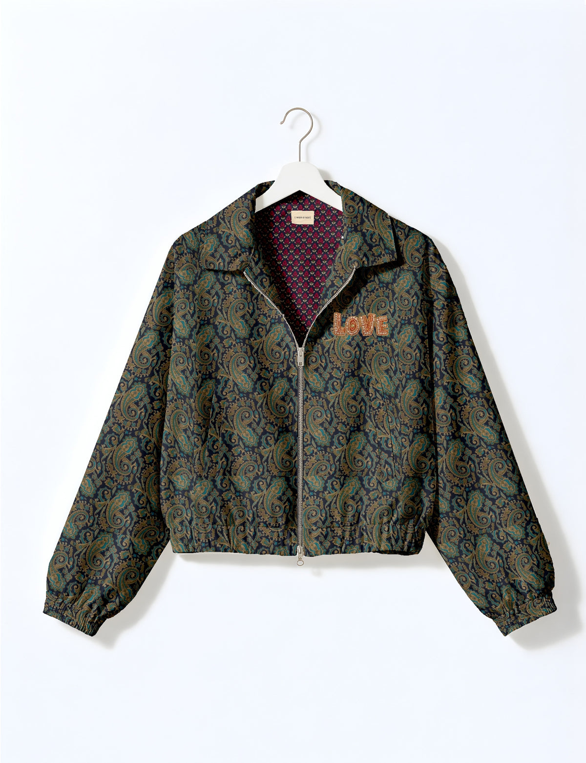 Love Bomber Jacket made from recycled fabric, featuring hand-stitched Aari embroidery. A unique piece of zero-waste clothing, part of the circular fashion movement. Designed with upcycled materials for a stylish yet environmentally friendly clothing choice.