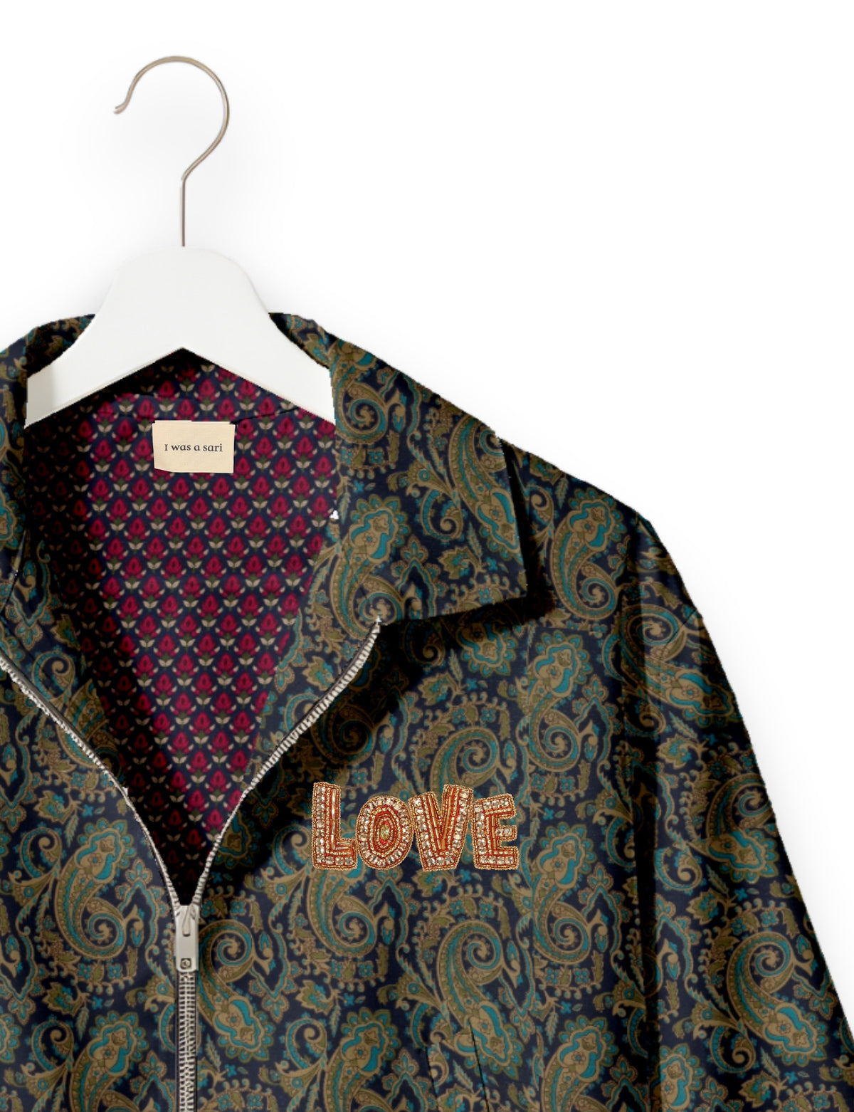 Love Bomber Jacket made from recycled fabric, featuring hand-stitched Aari embroidery. A unique piece of zero-waste clothing, part of the circular fashion movement. Designed with upcycled materials for a stylish yet environmentally friendly clothing choice.