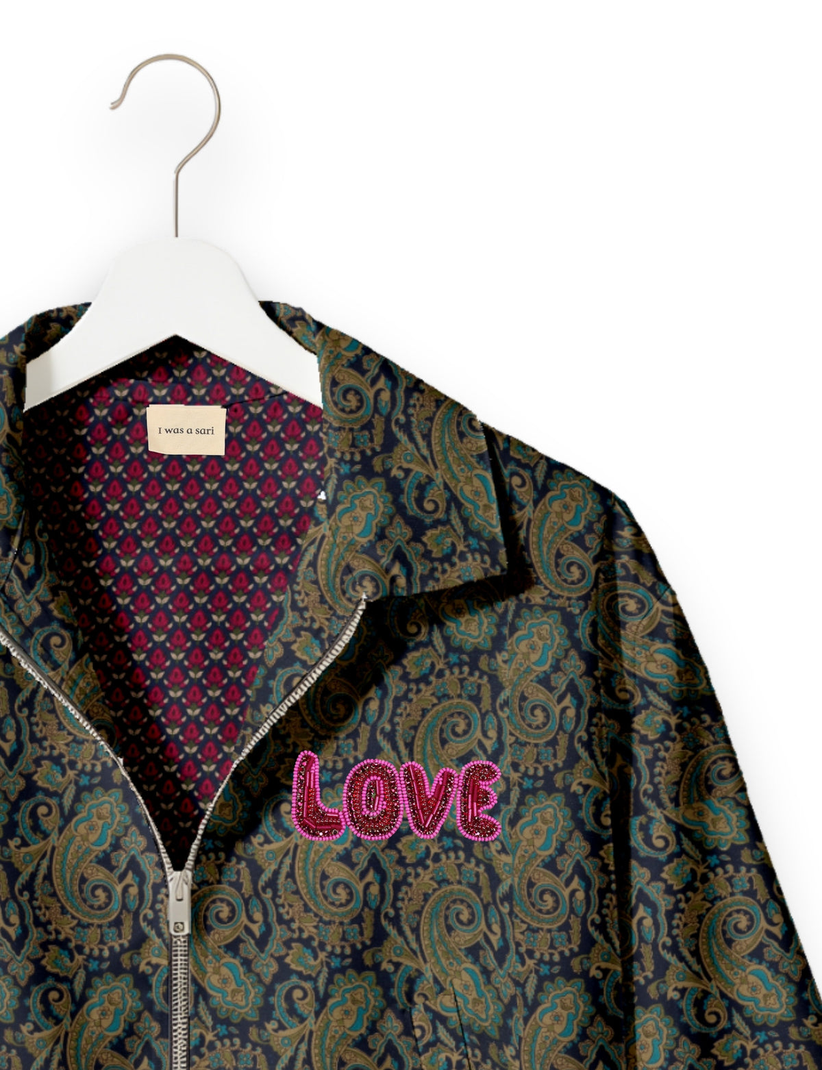 Love Bomber Jacket made from recycled fabric, featuring hand-stitched Aari embroidery. A unique piece of zero-waste clothing, part of the circular fashion movement. Designed with upcycled materials for a stylish yet environmentally friendly clothing choice.