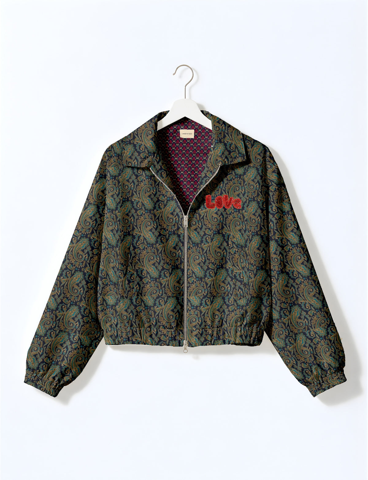 Love Bomber Jacket made from recycled fabric, featuring hand-stitched Aari embroidery. A unique piece of zero-waste clothing, part of the circular fashion movement. Designed with upcycled materials for a stylish yet environmentally friendly clothing choice.