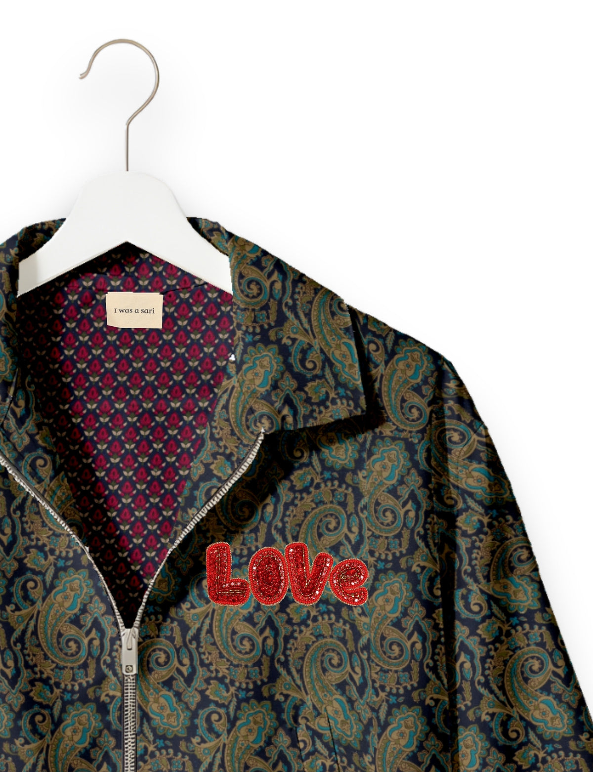 Love Bomber Jacket made from recycled fabric, featuring hand-stitched Aari embroidery. A unique piece of zero-waste clothing, part of the circular fashion movement. Designed with upcycled materials for a stylish yet environmentally friendly clothing choice.