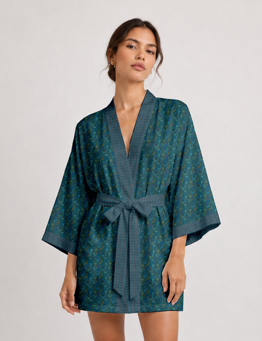 Short kimono robe with wrap front, V-neckline, wide sleeves, waist tie, and concealed skort detail.