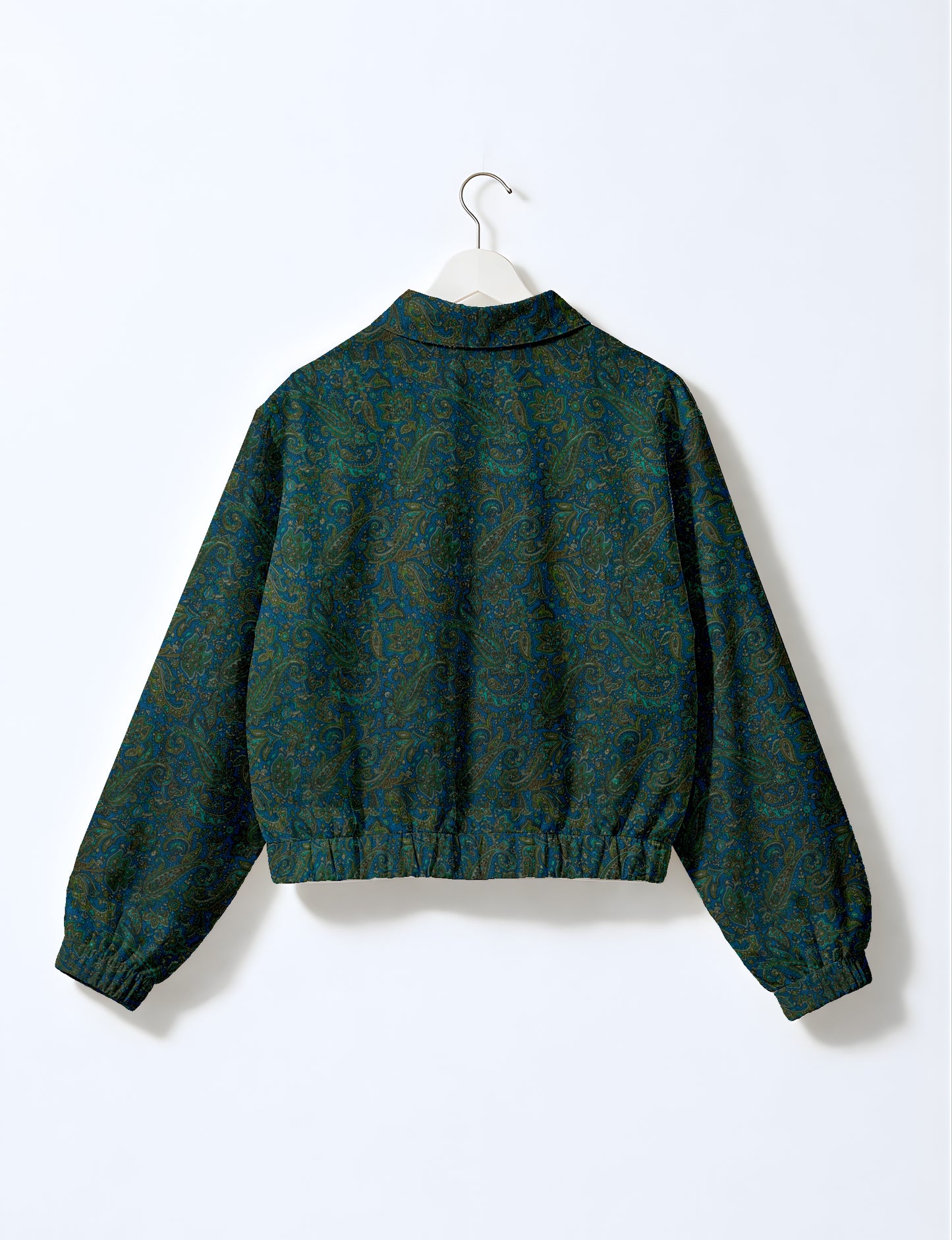 Yellow bomber jacket with micro diamond and floral pattern, elastic cuffs and waistband, shown from back on hanger