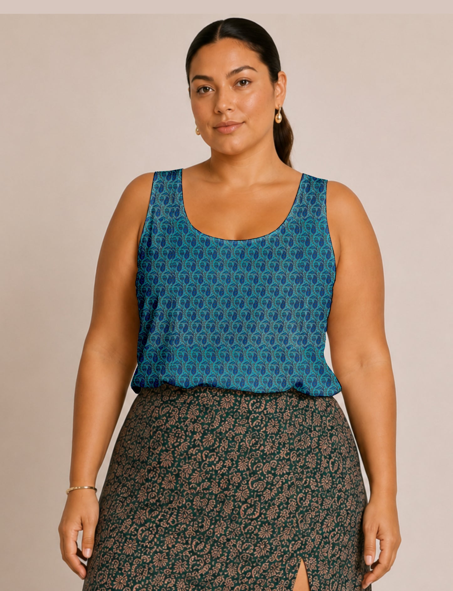 Women's sleeveless blouse with a relaxed straight fit, wide scoop neckline, deep scoop back, and hip-length silhouette.