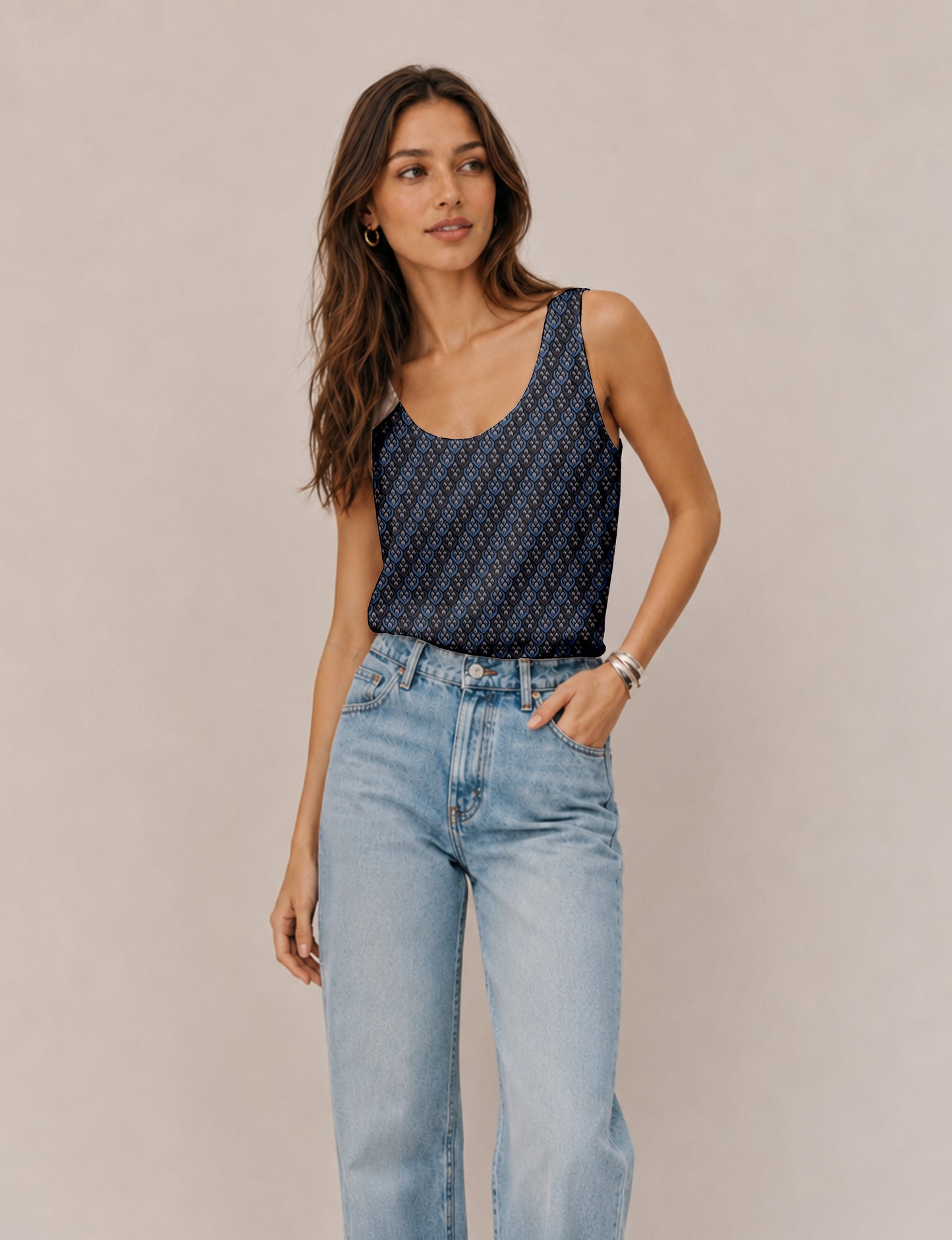 Women's sleeveless blouse with a relaxed straight fit, wide scoop neckline, deep scoop back, and hip-length silhouette.