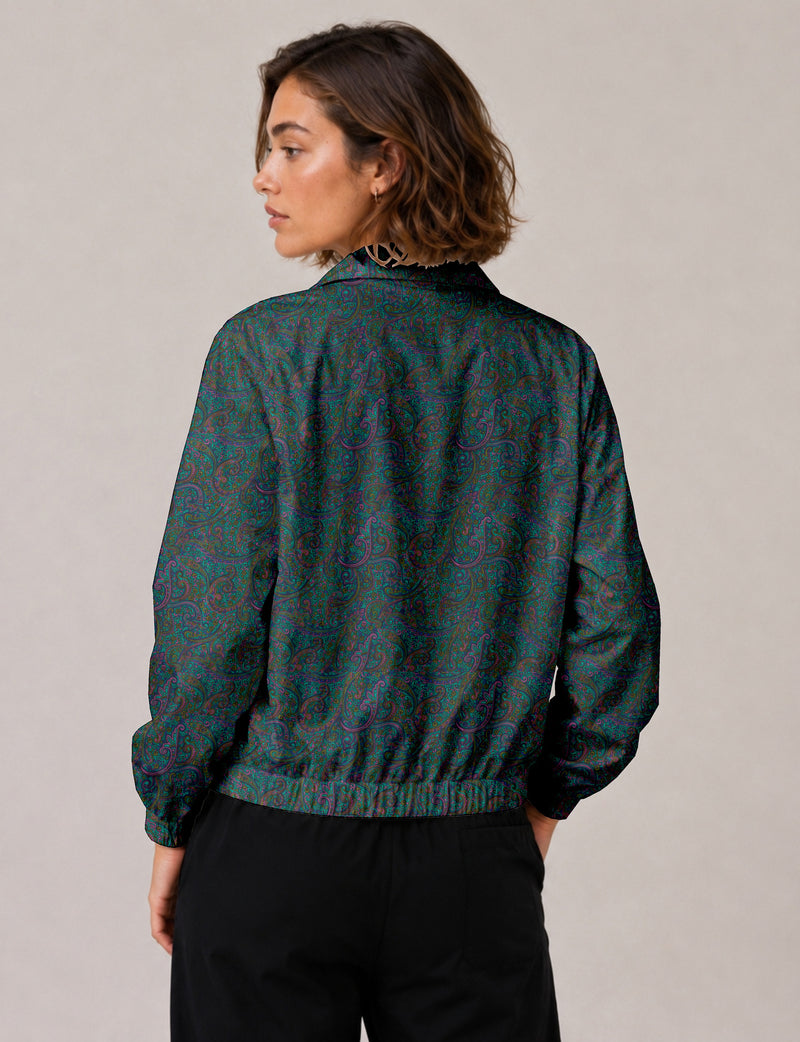 Brown floral bomber jacket with front zipper, elastic cuffs and hem, hanging on white hanger, red floral inner lining visible
