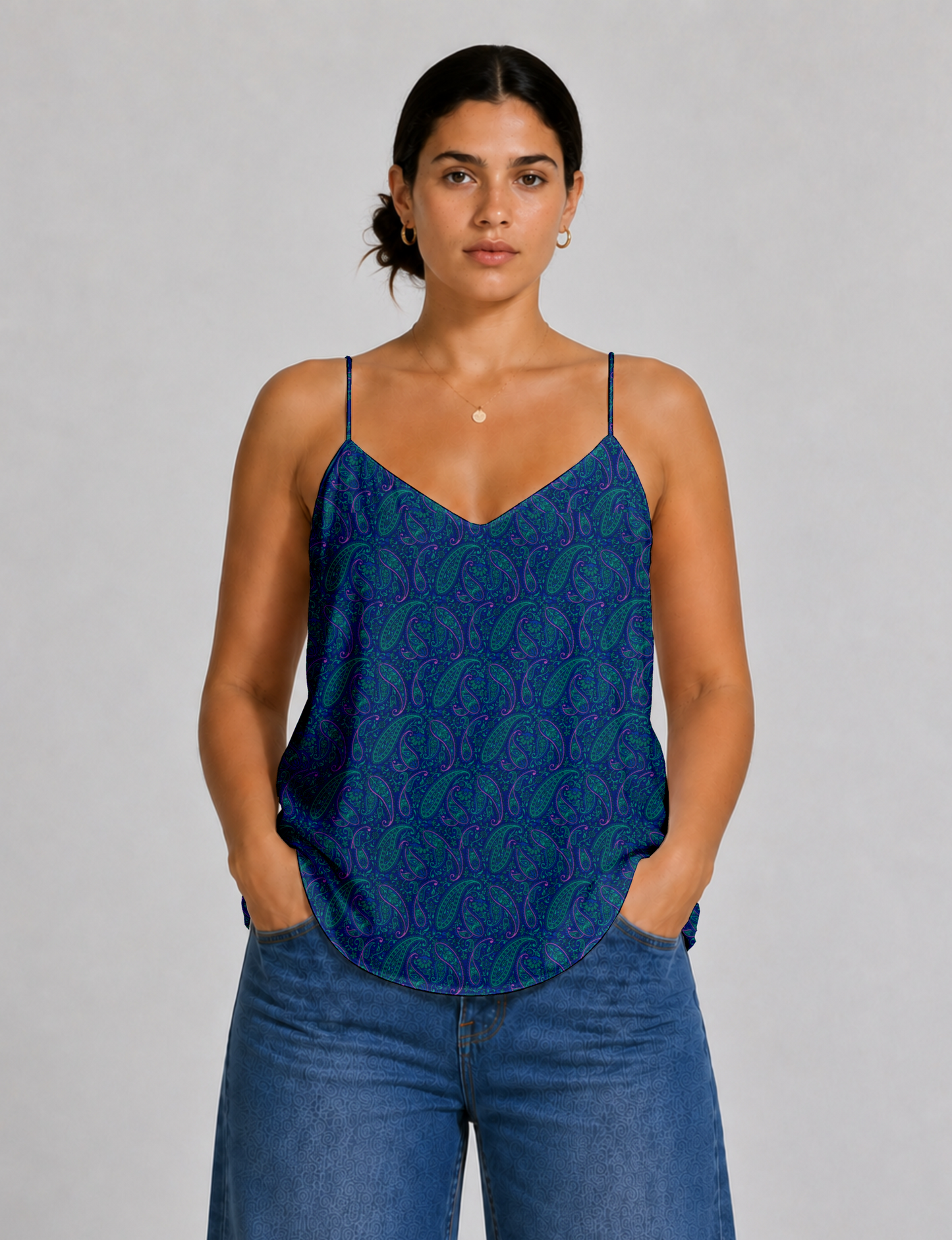 Women's sleeveless slip top with a relaxed straight fit, soft V-neckline, deep V-back, and delicate spaghetti straps.