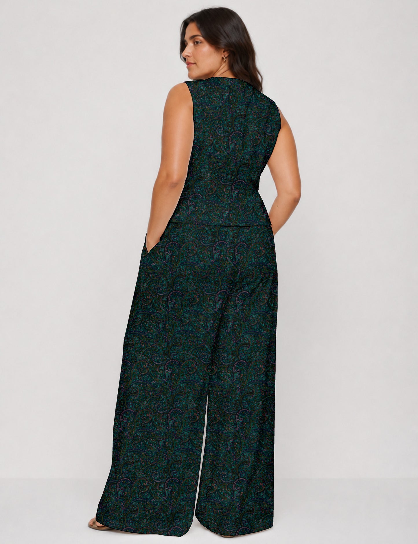 Women's tailored waistcoat set with a sleeveless V-neck button-front waistcoat and high-rise wide leg trousers in a coordinated matching outfit.